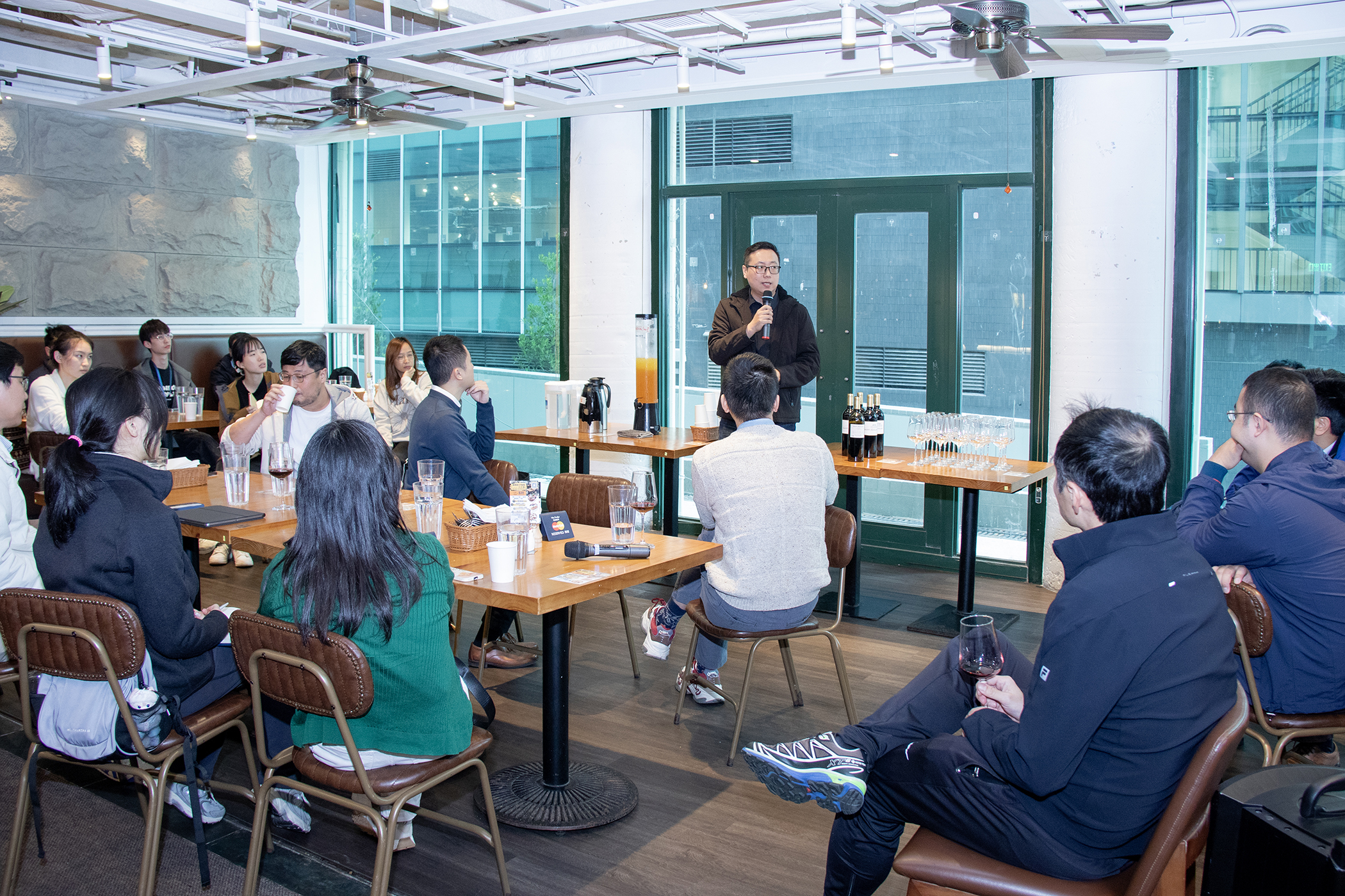 Participants are captivated by an insightful discussion during the Research Happy Hour on 26th February 2025.