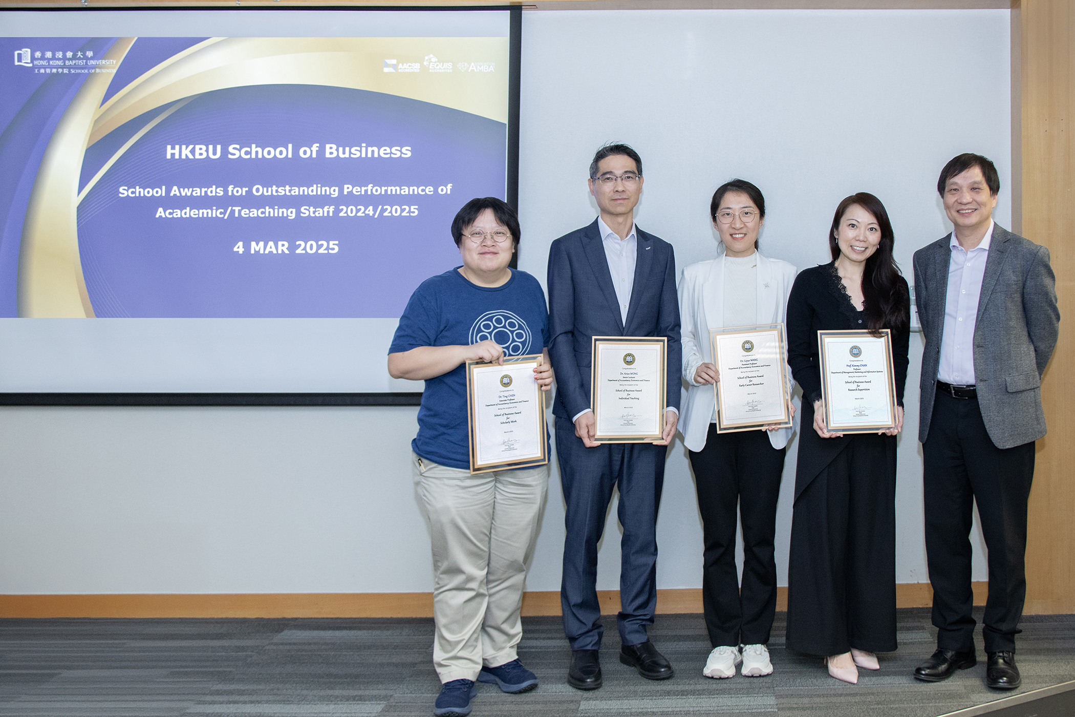 (From left to right) Prof. Ting CHEN, Dr. Aries WONG, Prof. Liyao WANG, and Prof. Kimmy CHAN receive awards from Prof. Han ZHANG for their exceptional contributions in teaching, research, and service. 