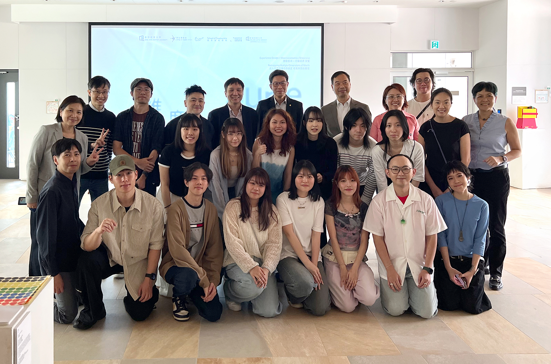 Capturing the creative minds behind “Out of the Curve”: organising committee members and instructors from the videography, songwriting, photography, and drawing workshops come together.