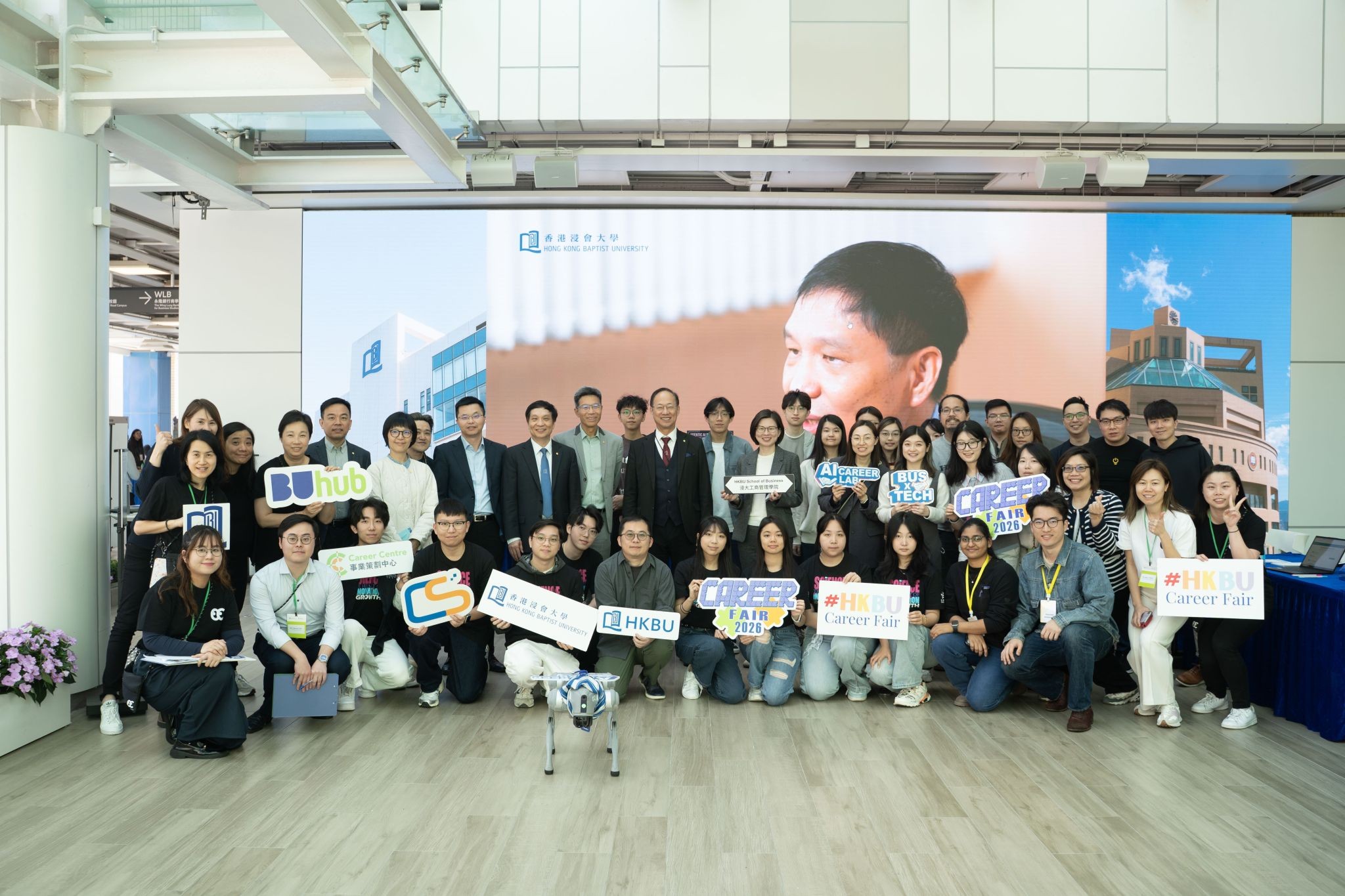 Professor Alexander Wai Ping-kong, JP, President and Vice-Chancellor of HKBU, Dr Albert Chau, Vice-President (Teaching and Learning) of HKBU, and Professor Zhang Han, Dean and Chair Professor of HKBU School of Business, join participants and organisers for a group photo at the HKBU Career Fair 2026. 