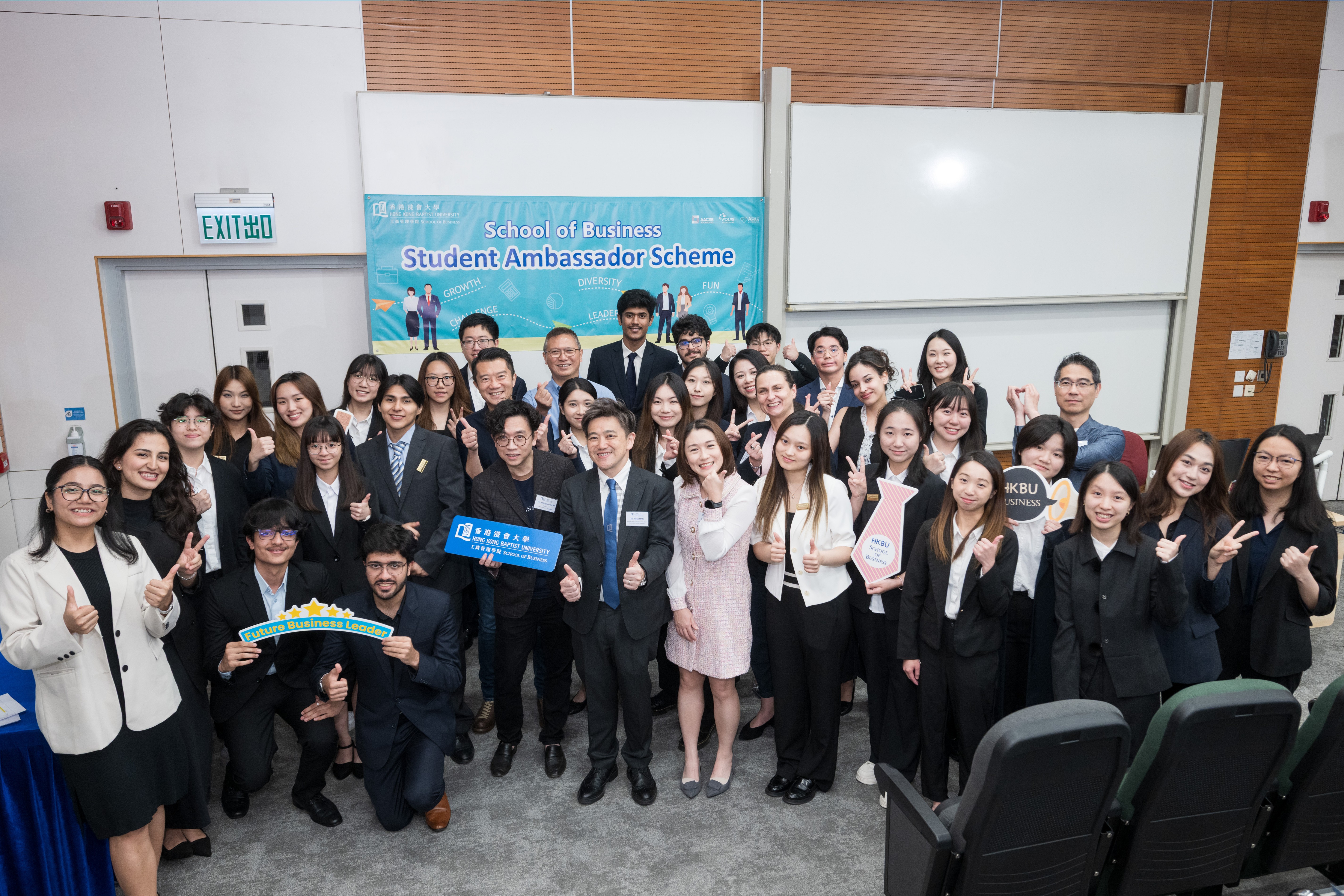 Newly commissioned and graduating Student Ambassadors of the HKBU School of Business gather with faculty members at the Ceremony, celebrating leadership, diversity, and shared achievements.
