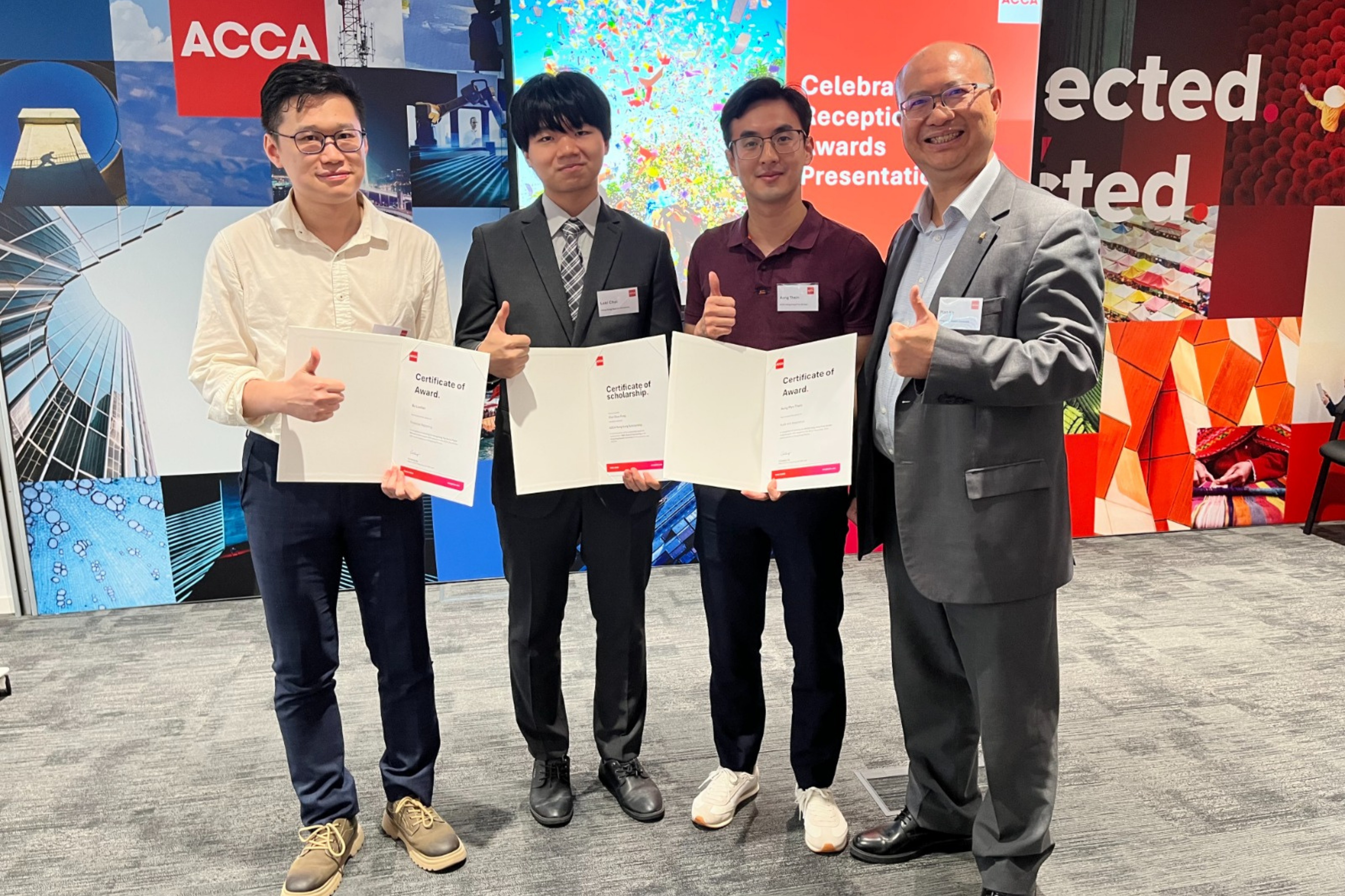 (From left to right) Dr Bu Loufan, recipient of the Top Score Paper Winner award in Financial Reporting; Mr Choi Hung-fung, recipient of the ACCA Hong Kong Scholarship; Mr Thein Aung Myo, recipient of the ACCA Hong Kong First Strider Award in Audit and Assurance; and Dr Man Ko, Senior Lecturer and Associate Head (Teaching), at the Celebration Reception.
